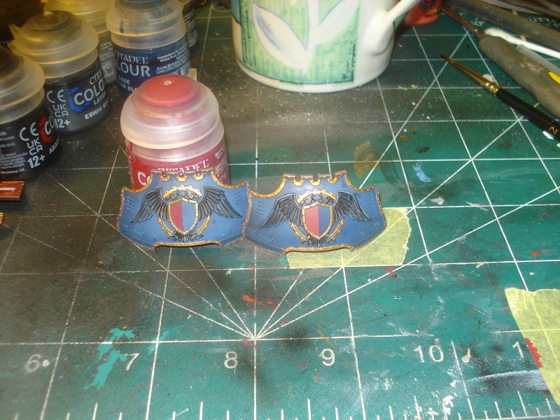 Eagles and shields painted